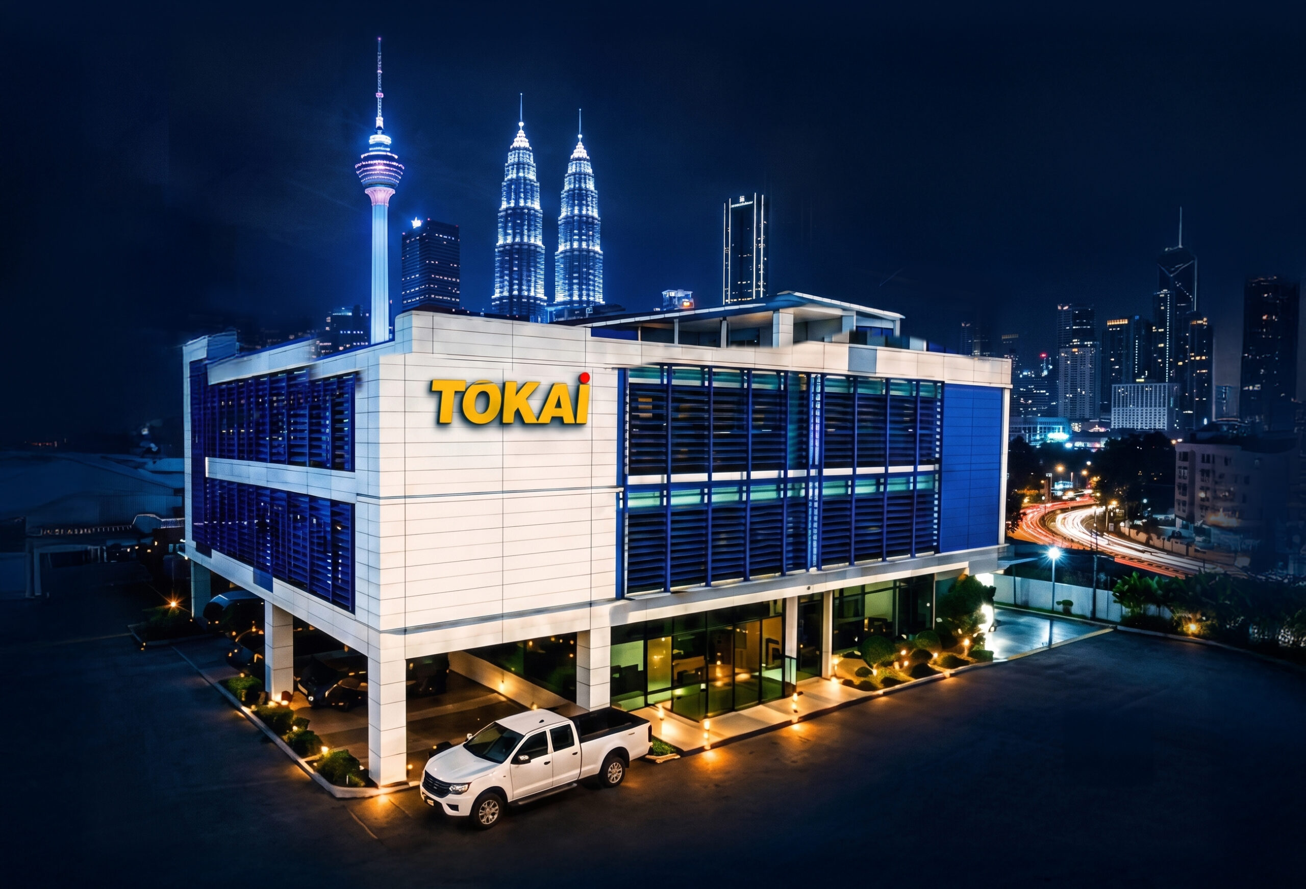 Tokai against a KL night skyline
